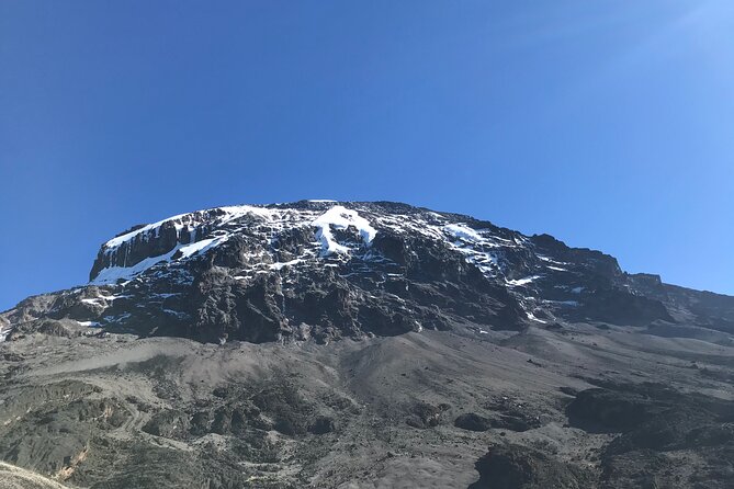 6-Day Private Guided Machame Hike Tour at Kilimanjaro - Day 2: rocky, dusty, and mostly bare, with slow acclimatization breaks