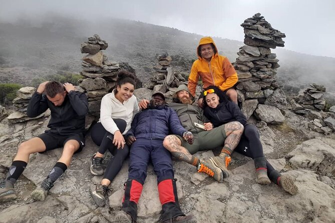 6 Days Private Mount Climbing in Kilimanjaro Machame Route - Day 6: Mweka Gate and the downhill finish from 3,090m