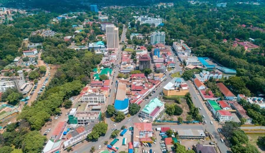 Arusha: City Walking Tour Historic and Modern Highlights - Starting at Soko Kuu Central Market, then using the Clock Tower to orient yourself