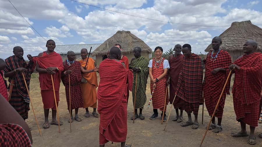 Arusha: Maasai Village Tour - Traditional Maasai clothing and the jumping dance