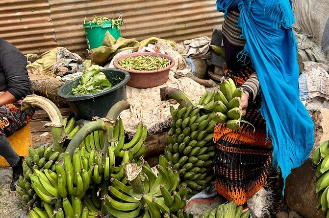 Arusha: Traditional Tanzania Cooking class& Food Market Tour - Liroy at the stalls, and how the guide turns chaos into a lesson