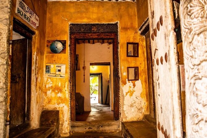 Bagamoyo Full-Day Tour: Historic Slave Trade Route & Kaole Ruins - Old Market and the baobab chain legend: export routes and the small stories people remember