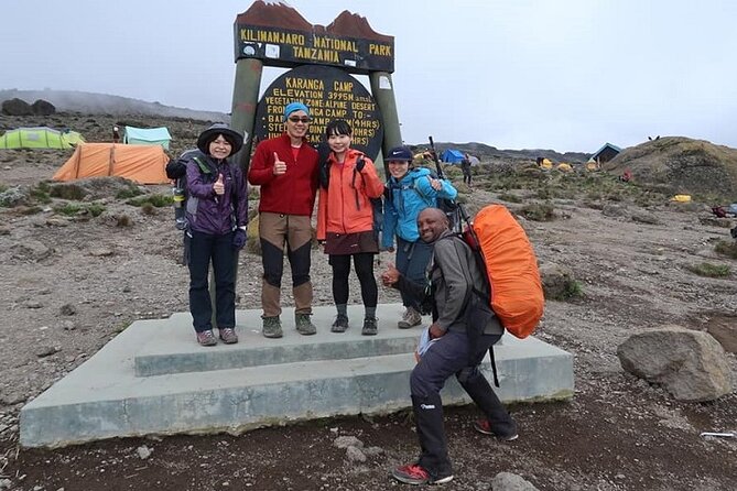Best 7 Days Machame Route group hiking on Kilimanjaro - Day 1 from Moshi to Machame Gate: registration, rainforest mud, and a soggy first lesson