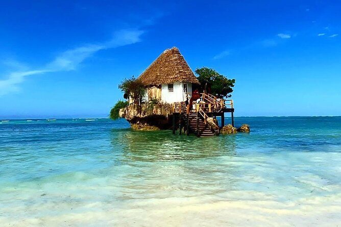 Full-day Tour Mnemba Jozani Forest Kuza Cave Paje Beach The Rock - The Rock Restaurant and tides: a view built into the sea