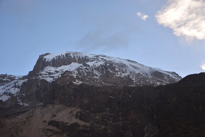 Kilimanjaro Climbing Umbwe Route - Day 6 Descent Through Mweka Forest: Certificates, Warm Shower, and Closing the Loop