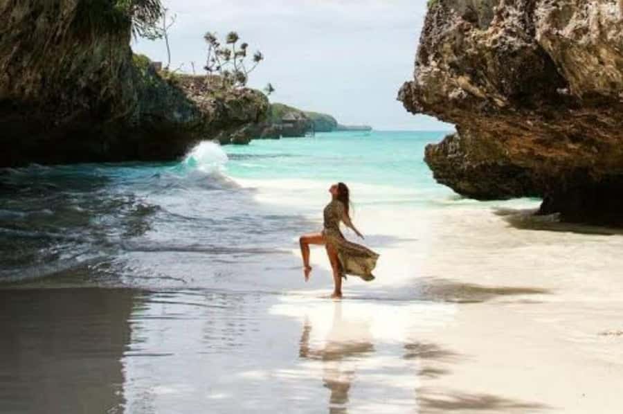 Kuza Cave, Hidden Mtende Beach & The Rock Restaurant - Mtende Beach: cliff views, low-tide walking, and a calmer shoreline mood