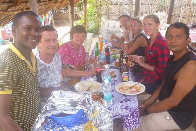 Kwale Island Dhow Sailing Tour from Zanzibar with Seafood Lunch - Fumba’s Blue Lagoon and mangroves: clear green-water snorkeling