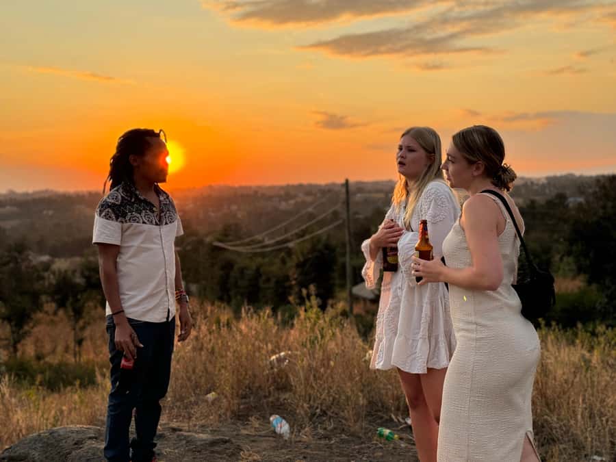 Moshi: Sunset Chill with Drinks and Roundtrip Transfer - Your Moshi sunset chill schedule: pickup, hilltop hour, back to town