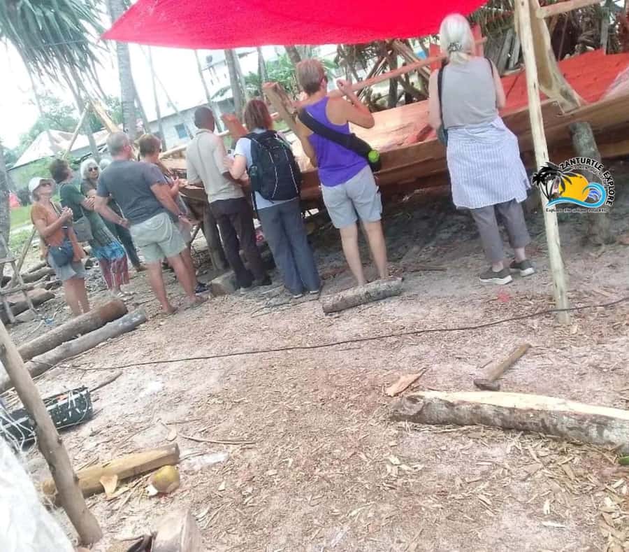Nungwi Village Tour & Swim with Turtles at Mnarani Aquarium - Mnarani Natural Aquarium, coral bedrock meets the tide