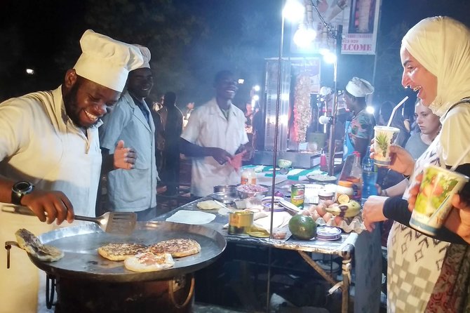 Stone Town Evening Walk Tour With Visit Food Markets - Entering Stone Town’s Night Food Scene, Starting at Old Fort