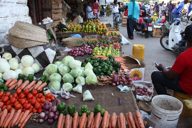 Stone Town Walking Tour in Zanzibar - Picking up your group: Old Fort meeting or hotel pickup