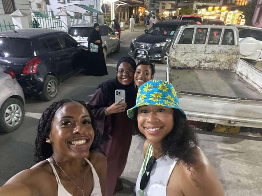 Stone Town Walking Tour with Female Guides - Walking the narrow lanes toward the Zanzibar Coffee House