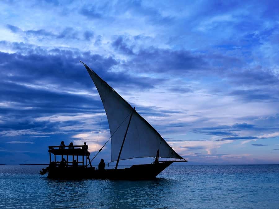 Sunset Dhow from Kendwa/Nungwi Magic Hour on the Ocean - Onboard Setup on a Traditional Dhow: Comfort, Crew, and the Sea Motion