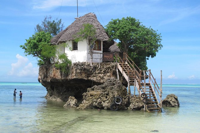 The Rock Restaurant & Blue Lagoon Half Day Tour in Zanzibar - Dongwe Blue Lagoon snorkeling: calm water plus included gear