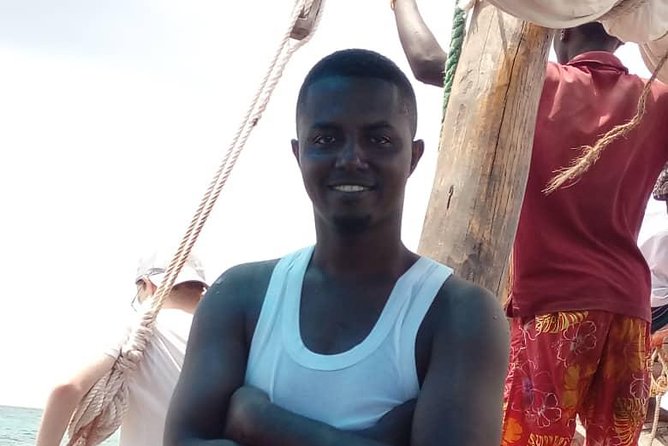 Zanzibar Dhow Cruise day adventure, sea sports at Kwale Island, very memorable - Snorkeling over coral reefs without the rush