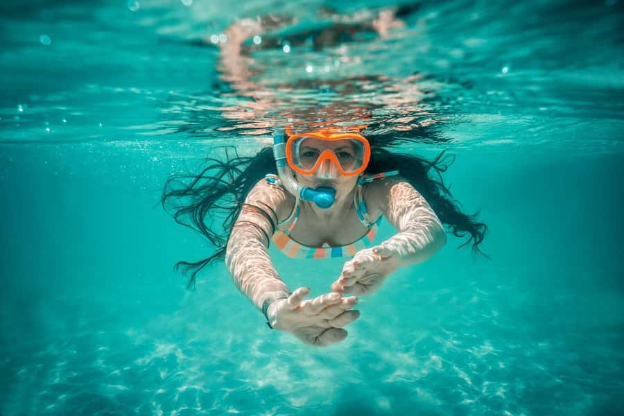 Zanzibar Mnemba island snorkling & swim with turtles Tour - How the 6-hour day fits together, from pickup to sea time
