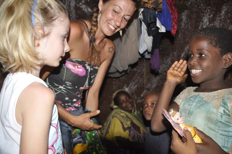 Zanzibar: Quad Bike Adventure Tour to a Local Village - The 1-hour local village visit: kids, fruit, and real conversations