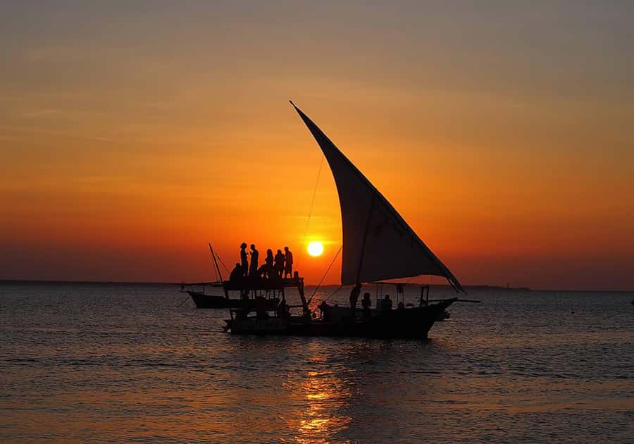 Zanzibar: Sunset Dhow Cruise - Kendwa Beach segment: photos, swimming, and the water-to-boat reality